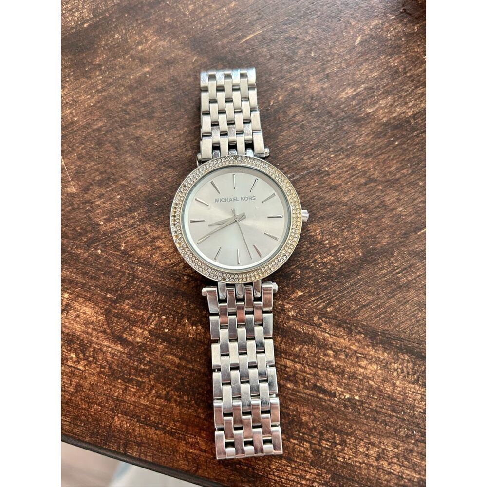 Michael Kors silver color faux diamond watch fits a small wrist 5 inches laying